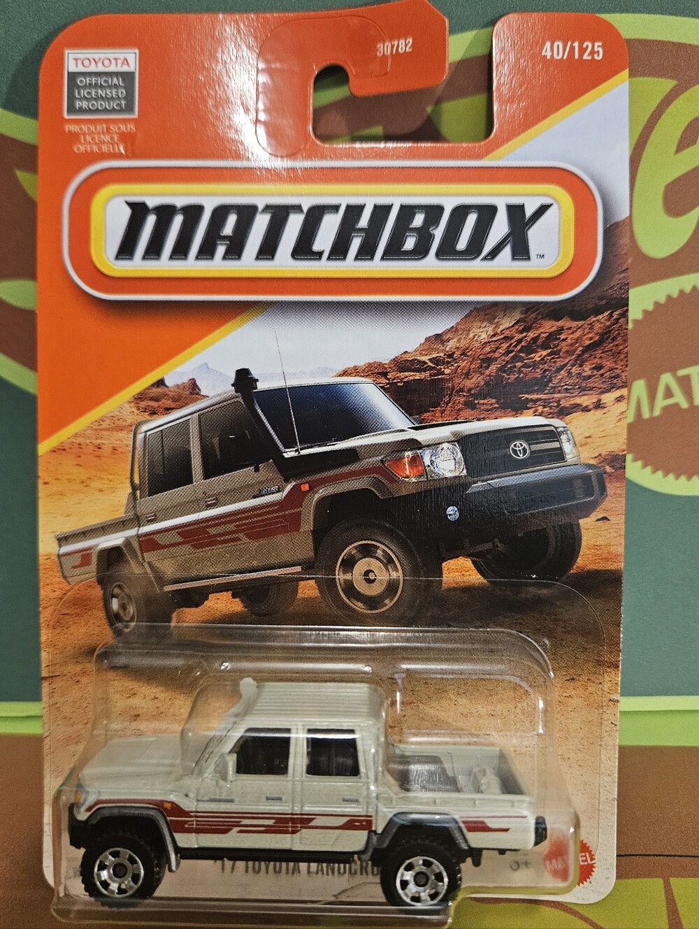 Matchbox '17 Toyota Land Cruiser Pickup - White with Red Stripes
